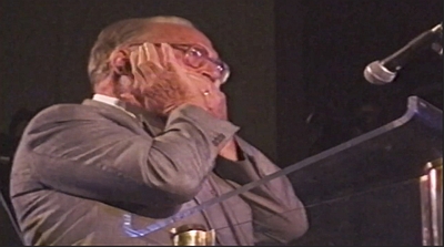Image of Robert Muller on the harmonica