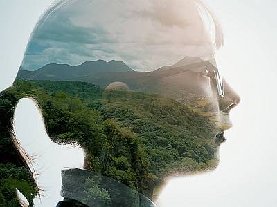 Image of a girl with visions of a beautiful planet